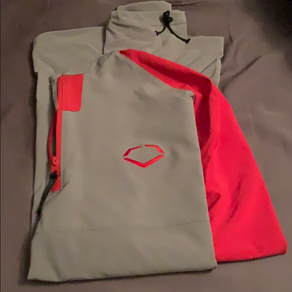 Gray and red evoshield coaching jacket
